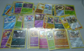 50 Holo/reverse holo Pokemon cards
