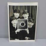 The Beatles original press photograph for ABC Television dated 1963 with cutting