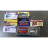 A collection of seven model vehicles, Atlas Editions and Vanguards, boxed
