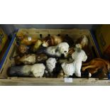 A collection of dog figures **PLEASE NOTE THIS LOT IS NOT ELIGIBLE FOR POSTING AND PACKING**