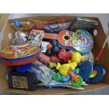 A box of assorted vintage toys