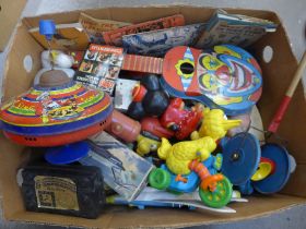 A box of assorted vintage toys