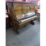 A Victorian burr walnut Pohlmann & Son, Patent Escapement Action overstrung upright piano. With