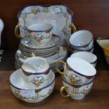 A Bavaria lustre six setting tea set with bread and butter plate, sugar and cream jug, one cup a/f