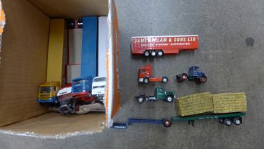 A collection of model trucks and lorries