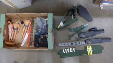 A collection of Action Man figures, clothing, accessories and a sea plane