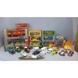 A box of die-cast model vehicles, Burago, Corgi, Matchbox, etc.