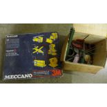 A Meccano motorised set and additional Meccano spare parts