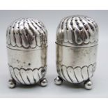 A pair of Victorian silver peppers, Birmingham and London marks, 38g