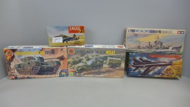 Five military model kits; two Airfix, a Tamiya, Aurora and Eaglewall plastics