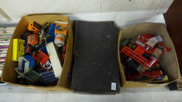 A collection of die-cast model vehicles including a case full of early Dinky Toys, playworn