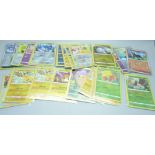 Over 50 holo and reverse holo Pokemon cards from sets Scarlet and Violet, Evolving Skies, etc.,