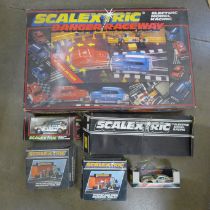 A Scalextric Banger Raceway set, additional cars and accessories