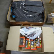 A case of Scalextric track and a box of Matchbox Scalextric cars, (four boxed) **PLEASE NOTE THIS