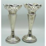 A pair of silver vases, Birmingham 1923, 15.5cm, weighted