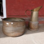 A large copper cauldron and a large jug