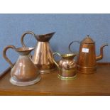 An Arts and Crafts brass and copper jug and three other copper jugs