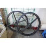 Two cast iron industrial wheels