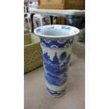 An oriental blue and white porcelain stick stand