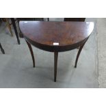 A Regency style mahogany demi lune hall table