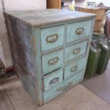 A vintage painted pine industrial chest