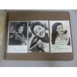 Two albums of 1940s and 1950s movie star and celebrity signed photographs, real and facsimile, one