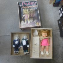 A Penny Puppywalker, boxed and other porcelain dolls