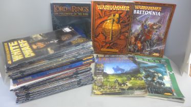 Twenty-three Games Workshop White Dwarf magazines, six Games Workshop The Lord of The Rings Strategy
