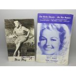 A Betty Grable autographed magazine, 1970 and an autographed black and white photograph of Doris Day