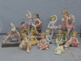A collection of resin models of children