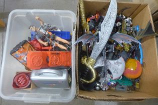 Two boxes of action figures and toys including Mega Blox creatures and Action Man