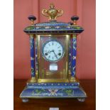 A French style gilt metal and blue champleve enamelled desk clock