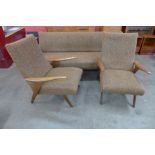 A Greaves & Thomas teak and fabric upholstered three piece lounge suite, comprising a sofa/daybed
