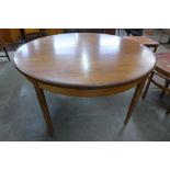 A G-Plan Fresco teak circular extending dining table