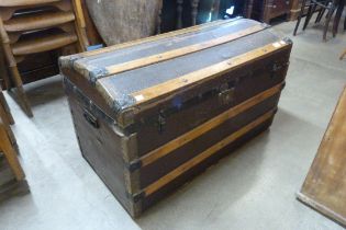 An early 20th Century dome topped steamer trunk