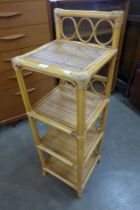 A bamboo and rattan four tier whatnot