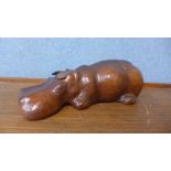 A small brown leather hippopotamus