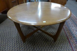 An Ercol Blonde ash circular coffee table