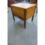 A teak single drawer sewing box