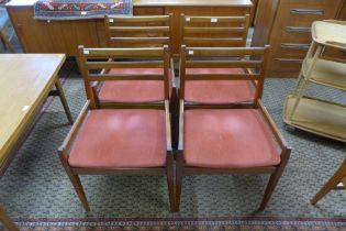 A set of four dining teak chairs