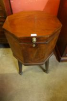 A George III mahogany octagonal wine cooler on stand