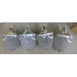 A set of four French Empire style pear shaped chandeliers