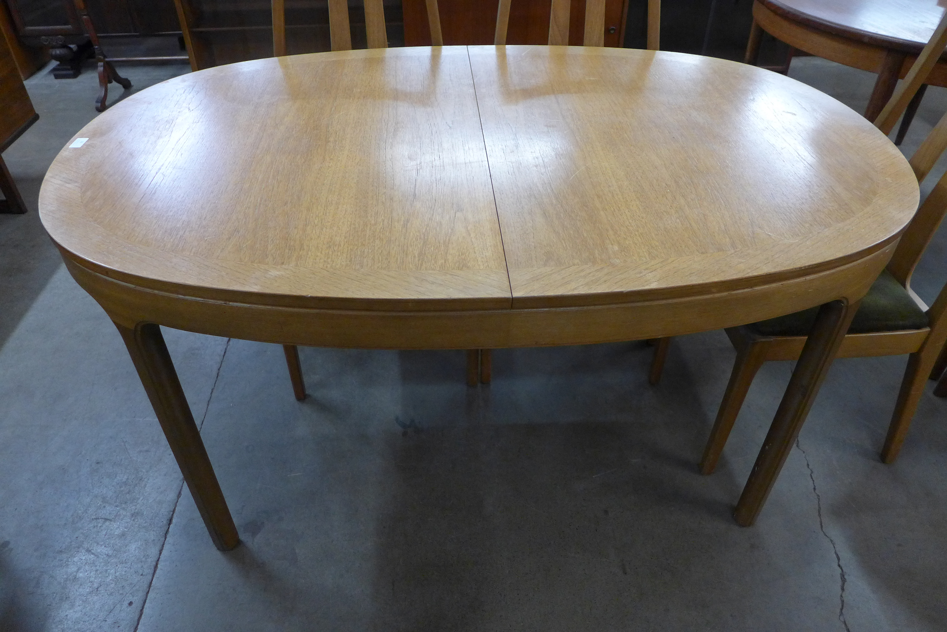 A Nathan teak extending dining table and six chairs - Image 2 of 3