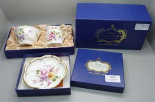 A Royal Crown Derby Derby Posies pin dish and cream jug and sugar bowl, all boxed