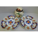 Two Imari plates and a ginger jar