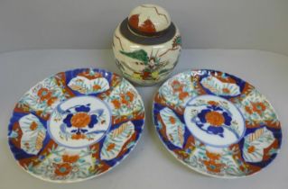 Two Imari plates and a ginger jar