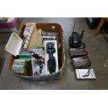 A box of camera equipment and one folding camera plus three radios and one radio/TV combi and a