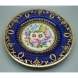 A circa 1830 royal blue cabinet plate with hand painted floral decoration, (some scratches and