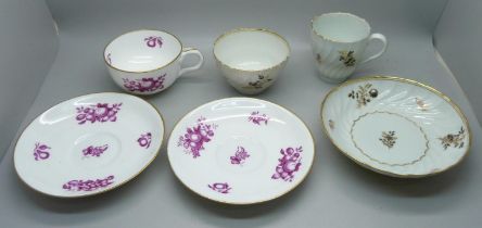 A 19th Century fine porcelain cup and two saucers and a Georgian fine porcelain trio, painted and