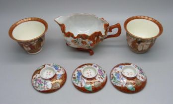 A pair of rare oriental Koutani Meiji period rice wine cups, three saucer lids/bases with iron red